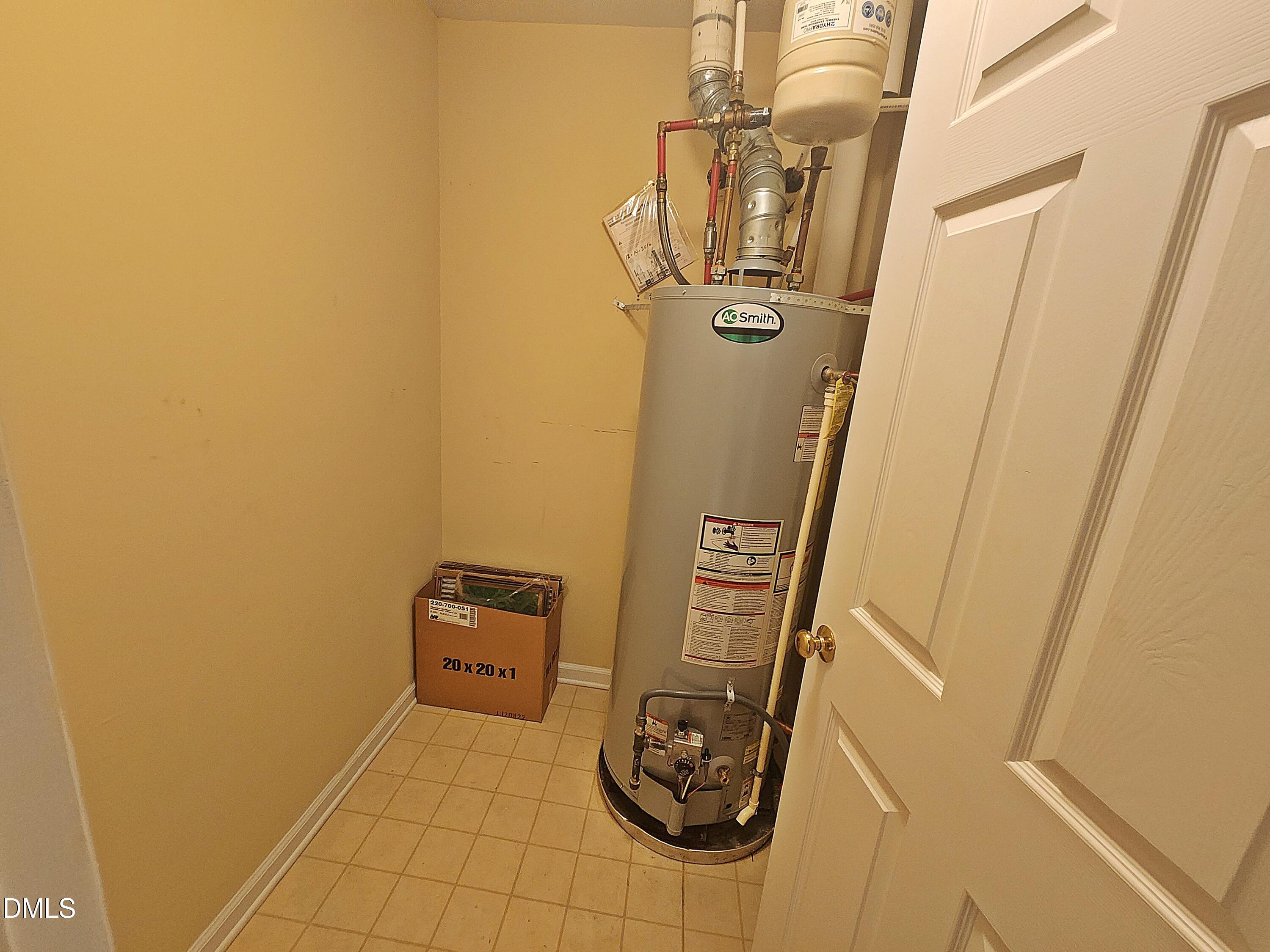 1615 Dunraven Drive Raleigh, NC 27612 - Photo 21 of 36 water heater closet