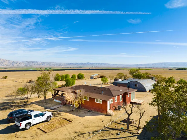 a view of swimming pool with furniture