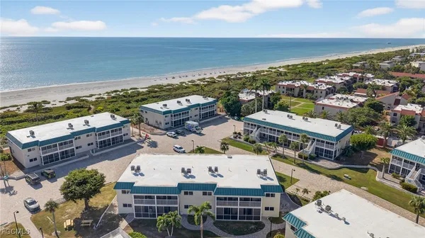 an aerial view of a building with outdoor space