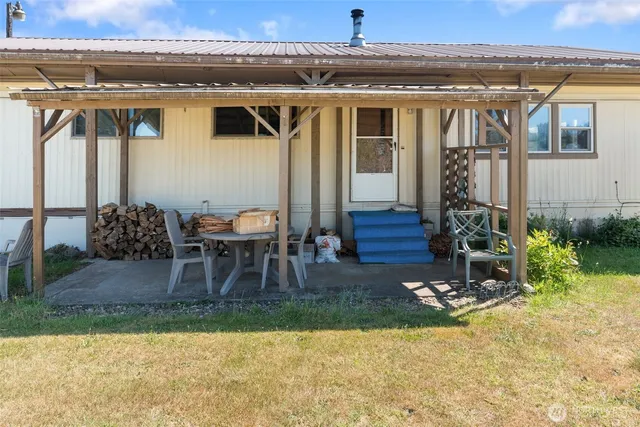 a view of a swimming pool with lounge chairs
