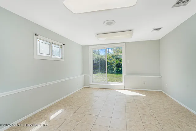 en empty room with windows