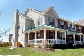 1939 Wagner Road, Unit 11A Batavia, IL 60510 - Photo 1 of 1 a front view of a house with a yard