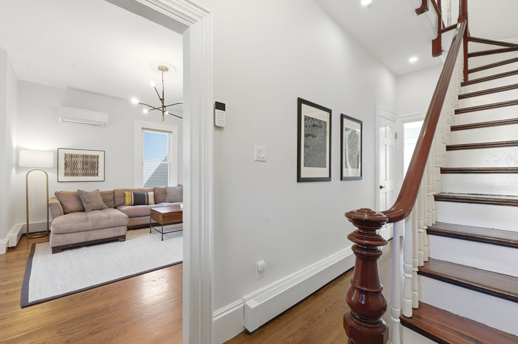 101 Forbes Street Boston, MA 02130 - Photo 19 of 38 a view of entryway and hall with wooden floor