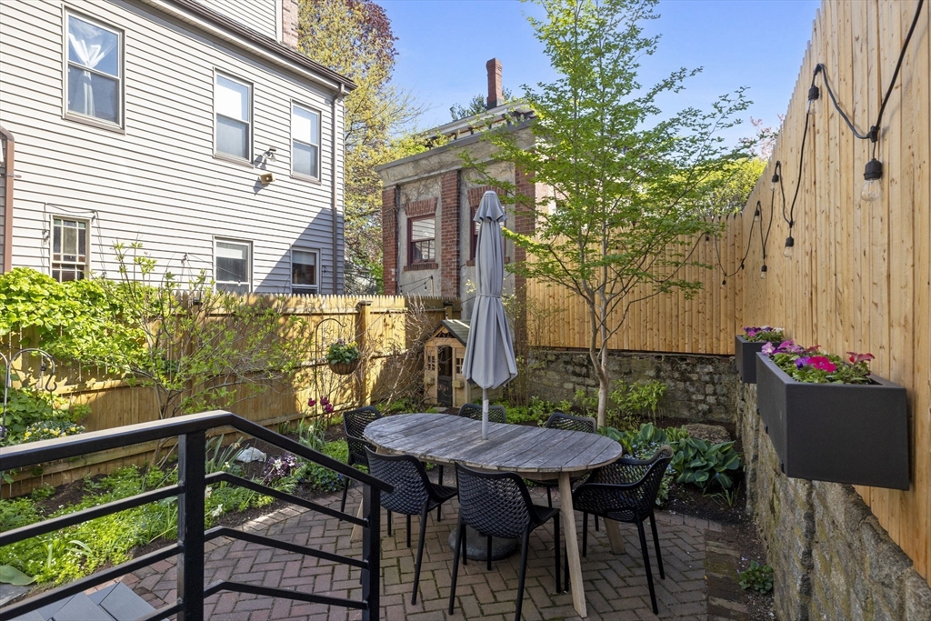 101 Forbes Street Boston, MA 02130 - Photo 36 of 38 a view of a chairs and table in the balcony