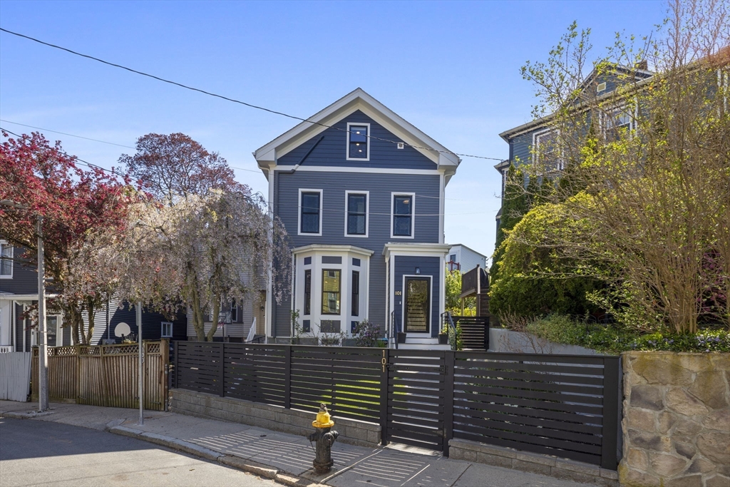 101 Forbes Street Boston, MA 02130 - Photo 4 of 38 a front view of a house with a yard
