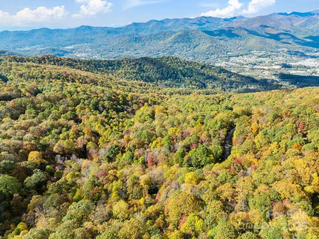 a view of lake and mountain