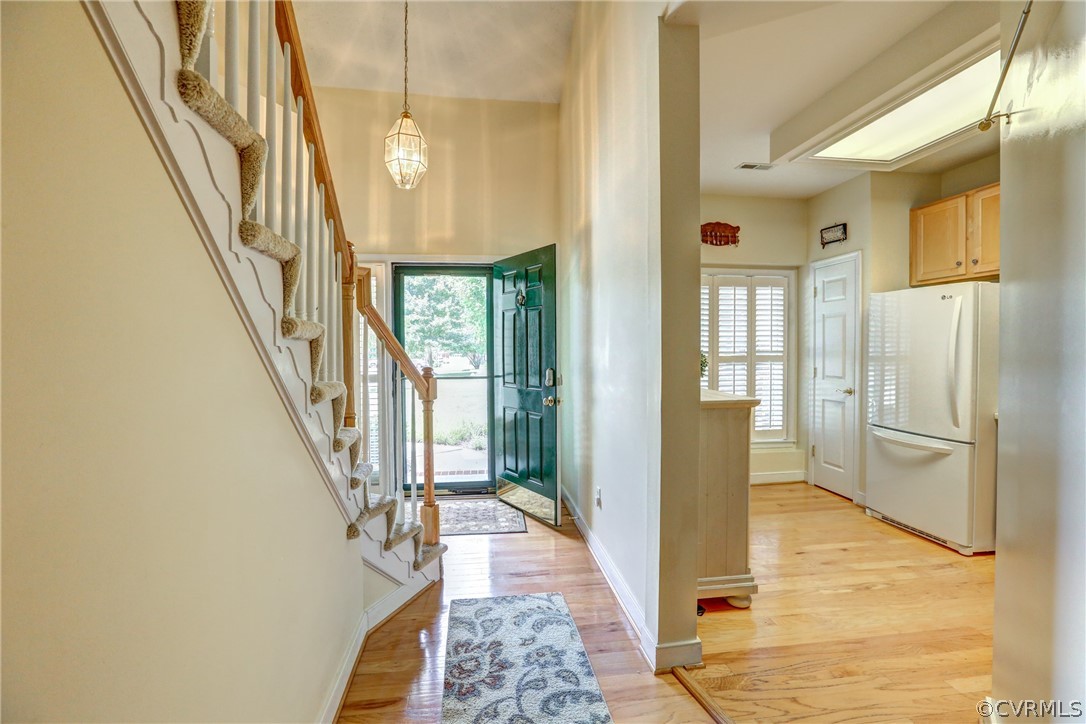 2232 Waters Mill Circle Richmond, VA 23235 - Photo 5 of 35 Gleaming Hardwoods, Plantation Shutters in Foyer a