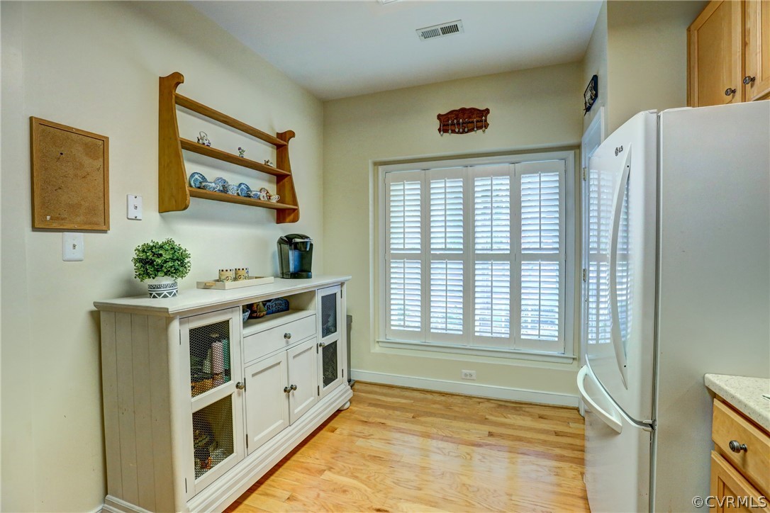 2232 Waters Mill Circle Richmond, VA 23235 - Photo 8 of 35 Plantation Shutters and space for a table.