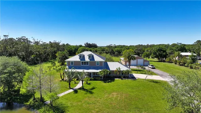 a view of a house with a swimming pool