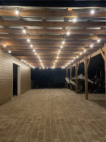 a view of an empty room with two washing machine