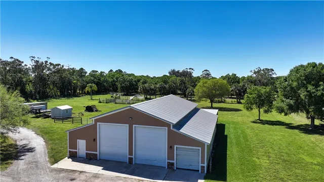 a aerial view of a yard in front of the house