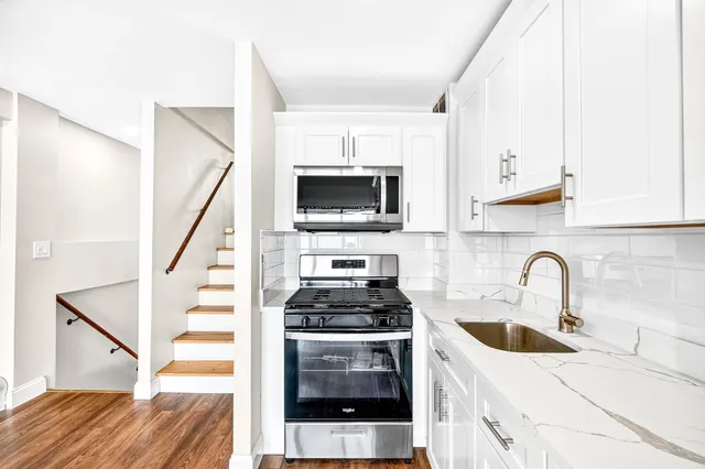 a bathroom with a sink and a bathtub