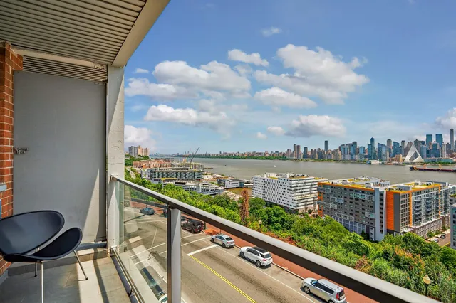 a view of a city with tall buildings