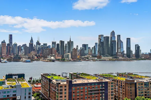 a view of a city with tall buildings