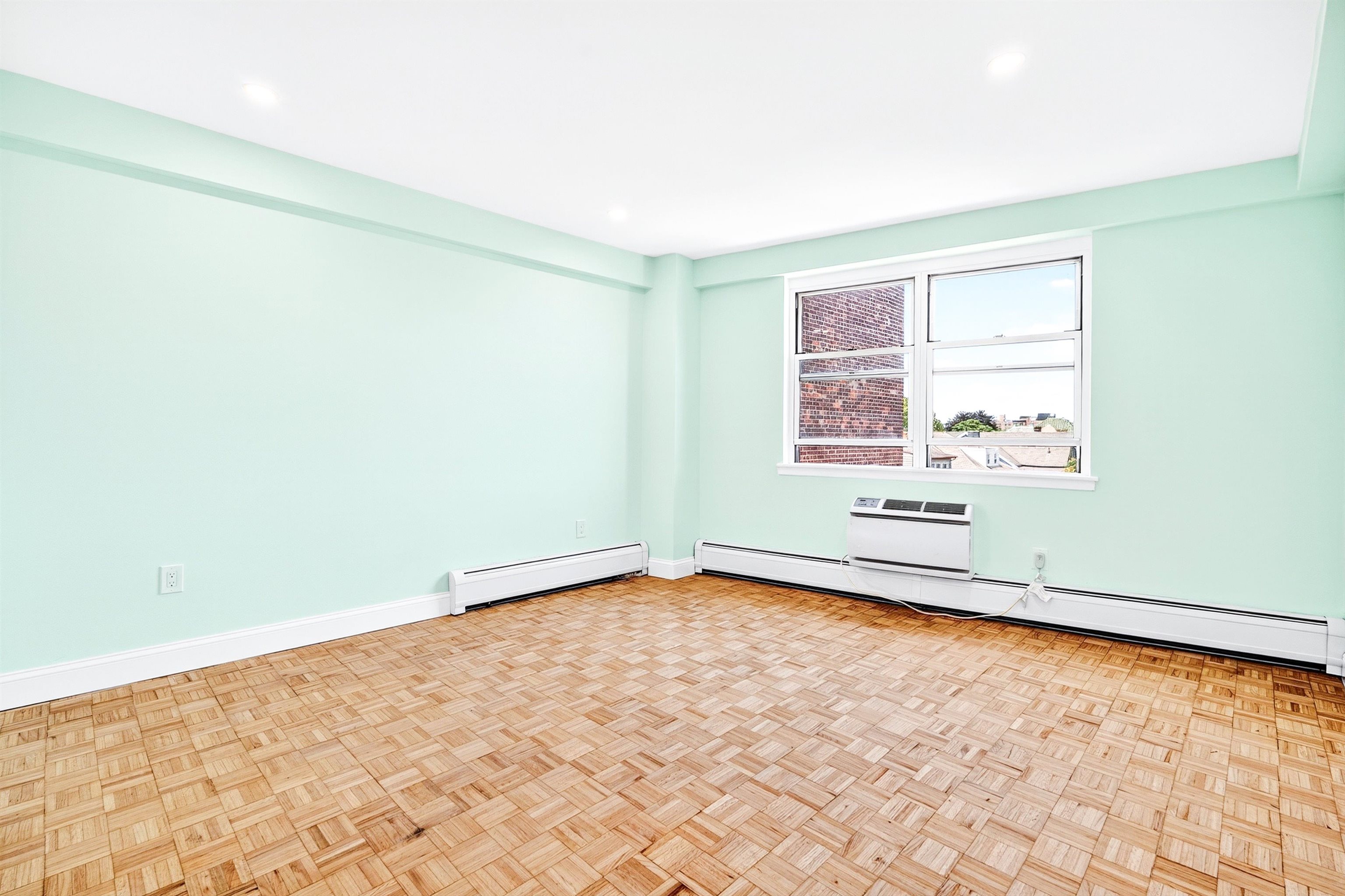 899 Boulevard East, Unit 4O Weehawken, NJ 07086 - Photo 37 of 50 an empty room with a window