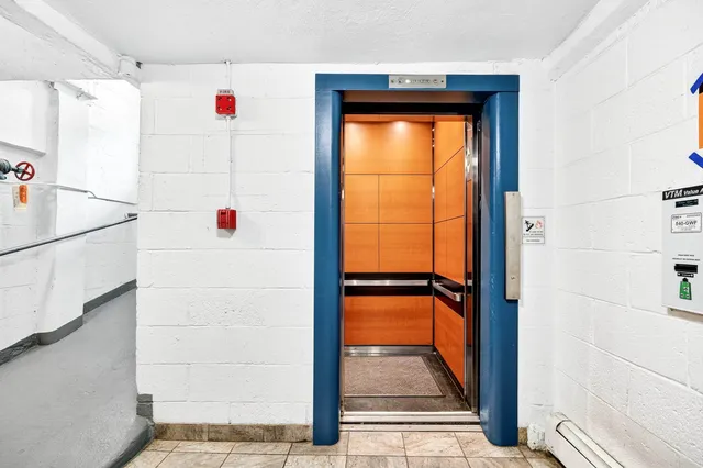 a view of building with large windows