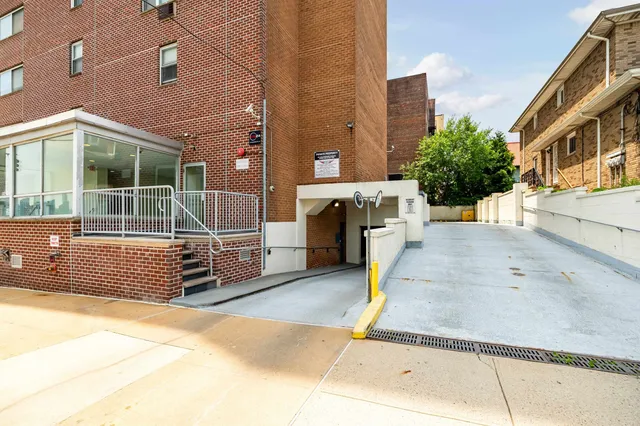 a picture of a cabinet with a white wall