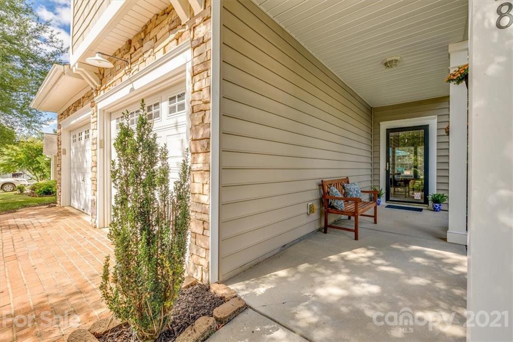 138 Whitley Mills Road Fort Mill, SC 29708 - Photo 2 of 38 a view of a porch with chairs and wooden fence