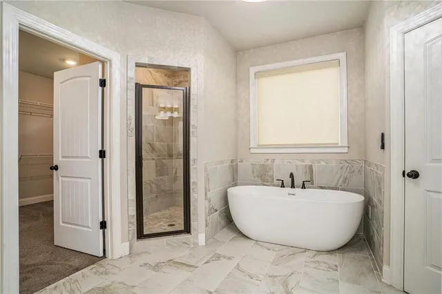 a bathroom with a sink toilet and a mirror