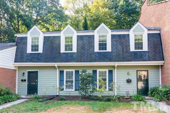 3148 Morningside Drive Raleigh, NC 27607 - Photo 1 of 24 front view of a house with a yard