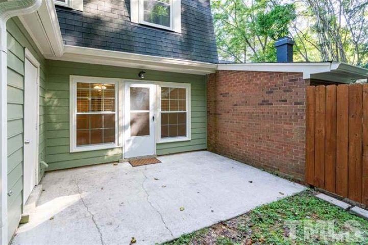 3148 Morningside Drive Raleigh, NC 27607 - Photo 2 of 24 a front view of a house with a yard