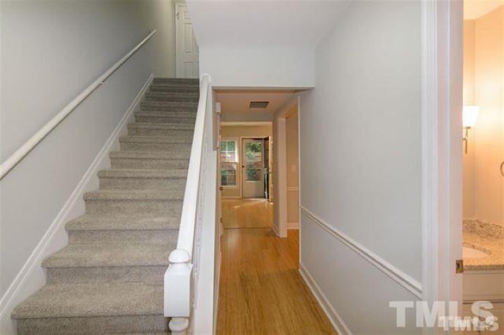 3148 Morningside Drive Raleigh, NC 27607 - Photo 11 of 24 a view of entryway and hall with wooden floor