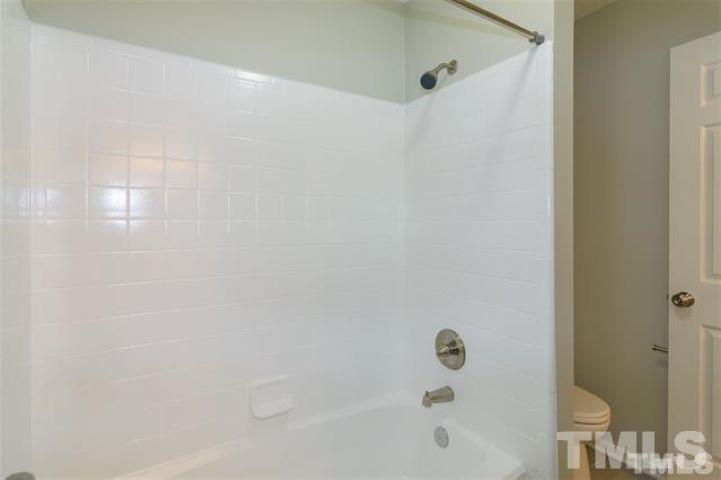 3148 Morningside Drive Raleigh, NC 27607 - Photo 17 of 24 a bathroom with a bathtub
