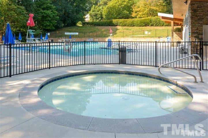 3148 Morningside Drive Raleigh, NC 27607 - Photo 23 of 24 a view of a swimming pool from a balcony