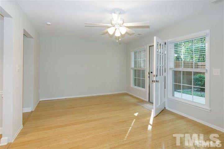 3148 Morningside Drive Raleigh, NC 27607 - Photo 4 of 24 a view of an empty room with a window
