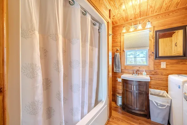 a view of a bathroom with a sink and dishwasher