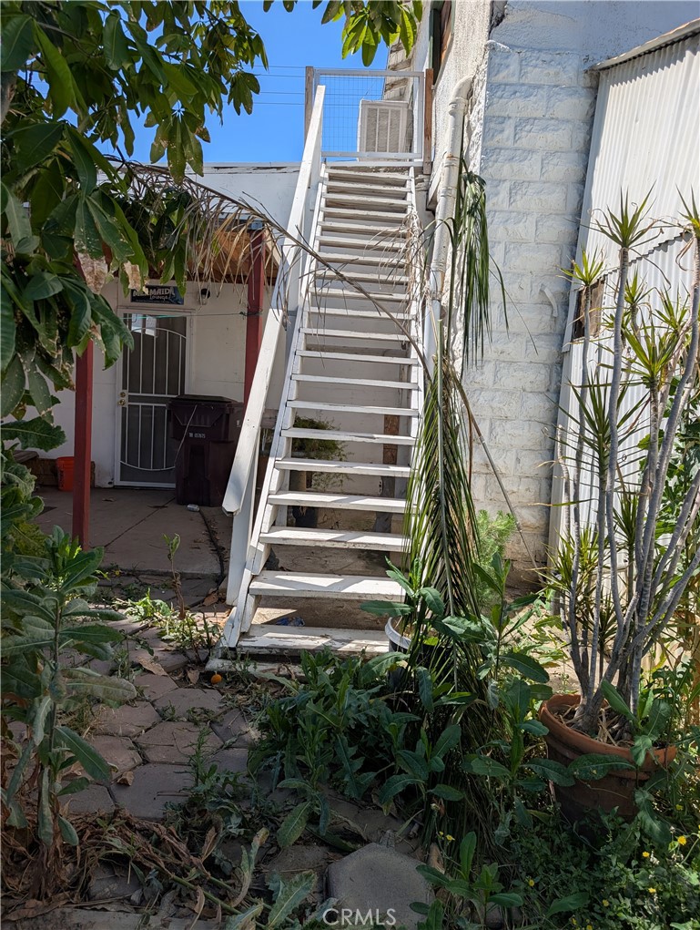 1071 Center Street Riverside, CA 92507 - Photo 13 of 24 a view of a yard in front of a house with a small yard