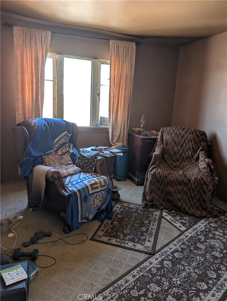 1071 Center Street Riverside, CA 92507 - Photo 18 of 24 a bedroom with furniture and a window