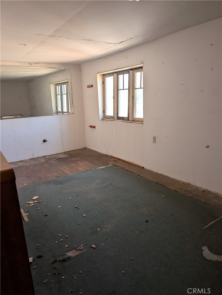 1071 Center Street Riverside, CA 92507 - Photo 20 of 24 a view of an empty room with a window