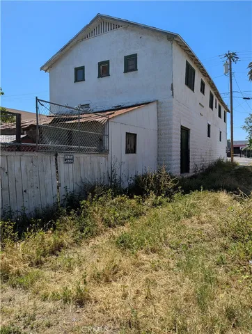 a front view of house with pathway and yard