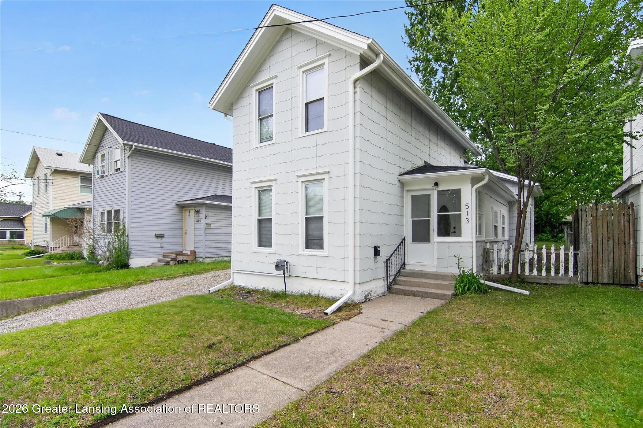 513 North Waterloo Avenue Jackson, MI 49201 - Photo 5 of 40 06-513-N-Waterloo-Ave-WindowStill