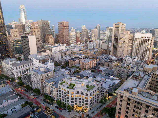 a city street lined with tall buildings