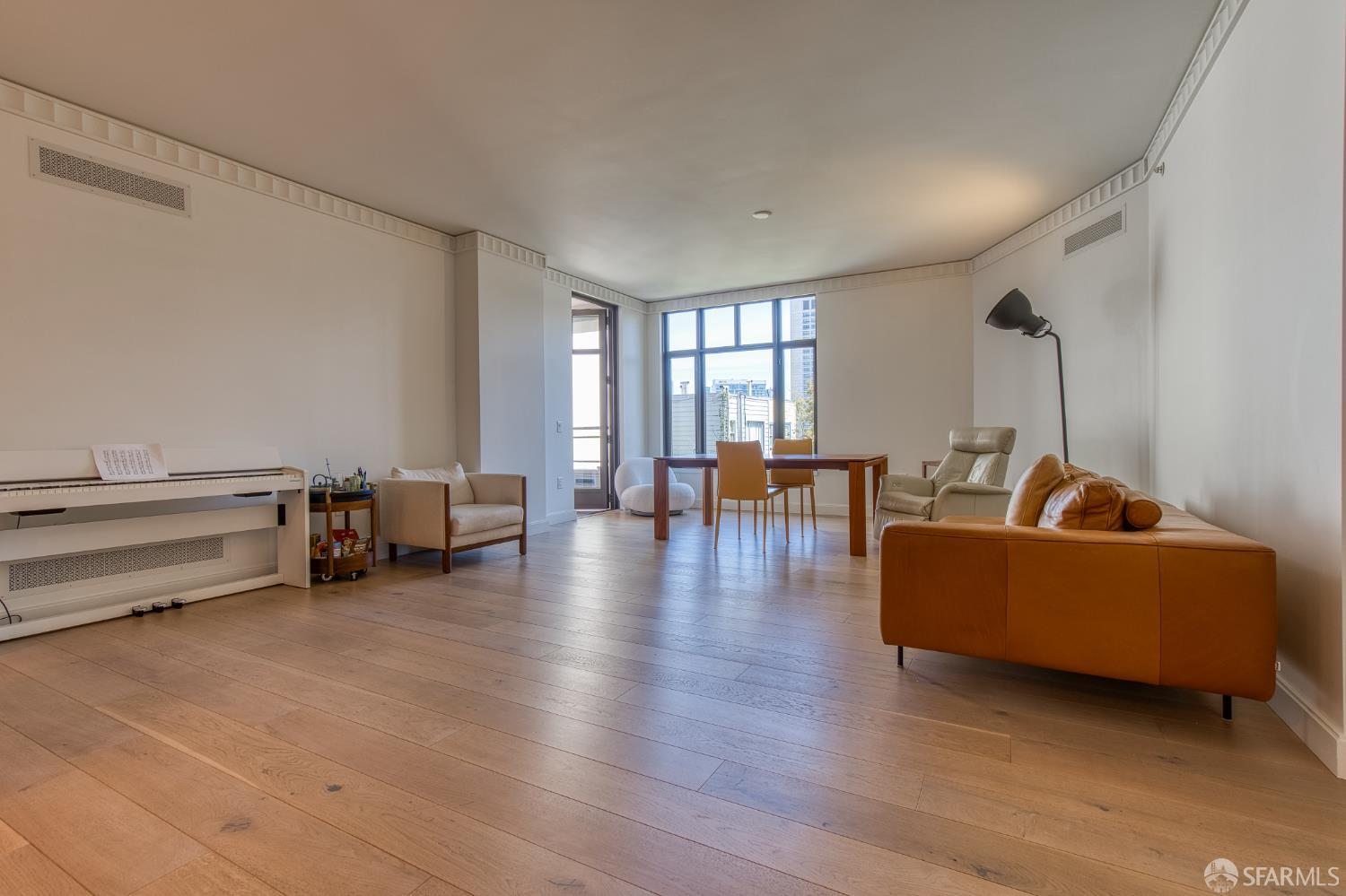 875 California Street, Unit 403 San Francisco, CA 94108 - Photo 32 of 56 a living room with furniture and wooden floor