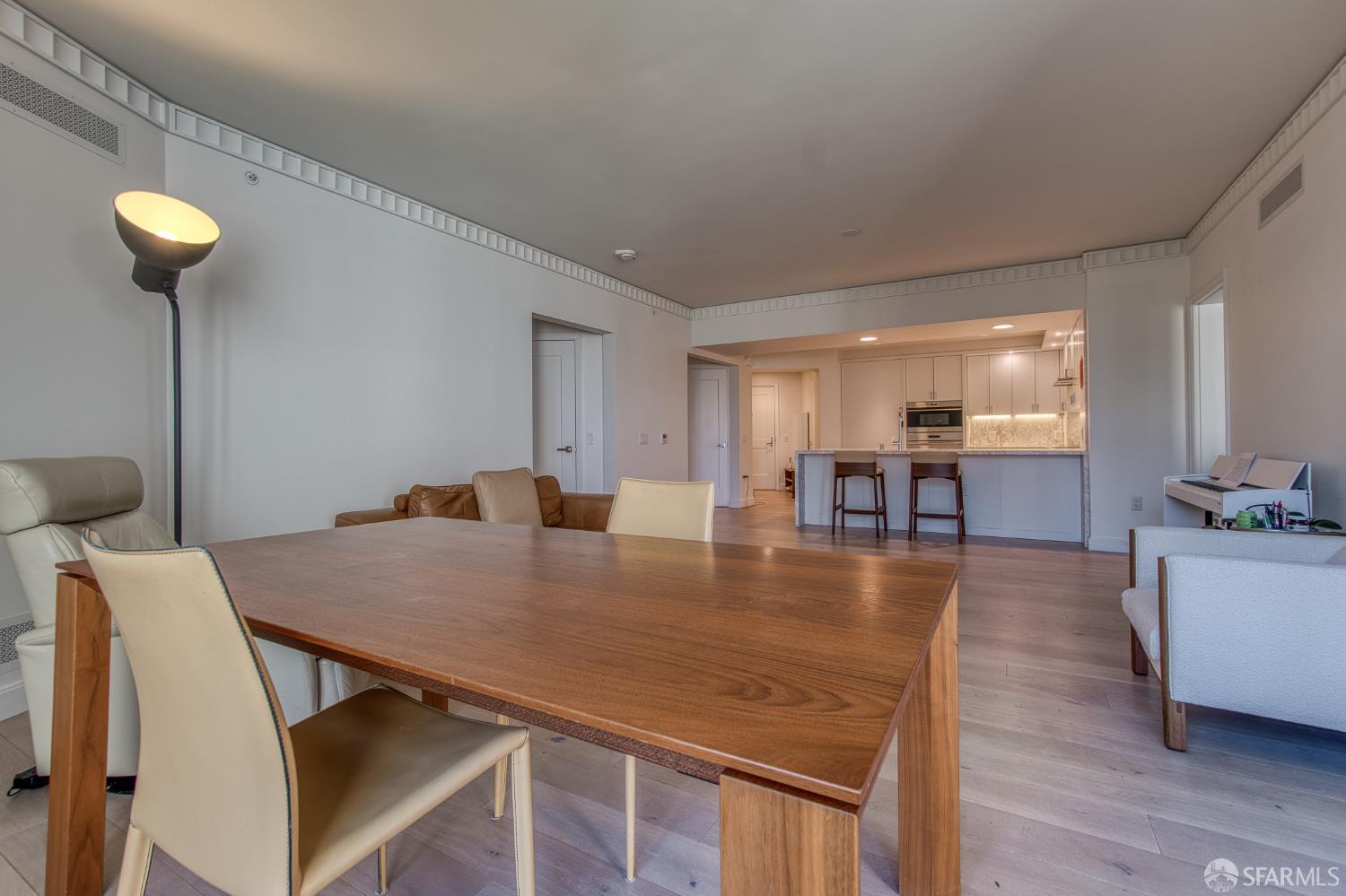 875 California Street, Unit 403 San Francisco, CA 94108 - Photo 34 of 56 a view of a dining room with furniture and wooden floor