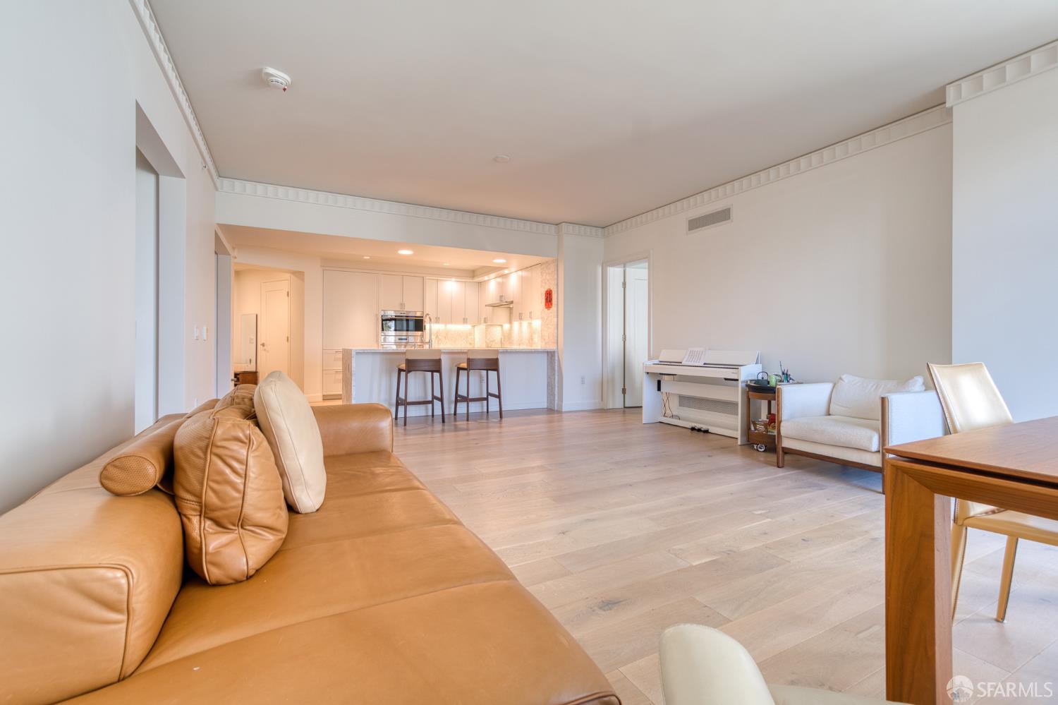 875 California Street, Unit 403 San Francisco, CA 94108 - Photo 35 of 56 a living room with furniture and a table