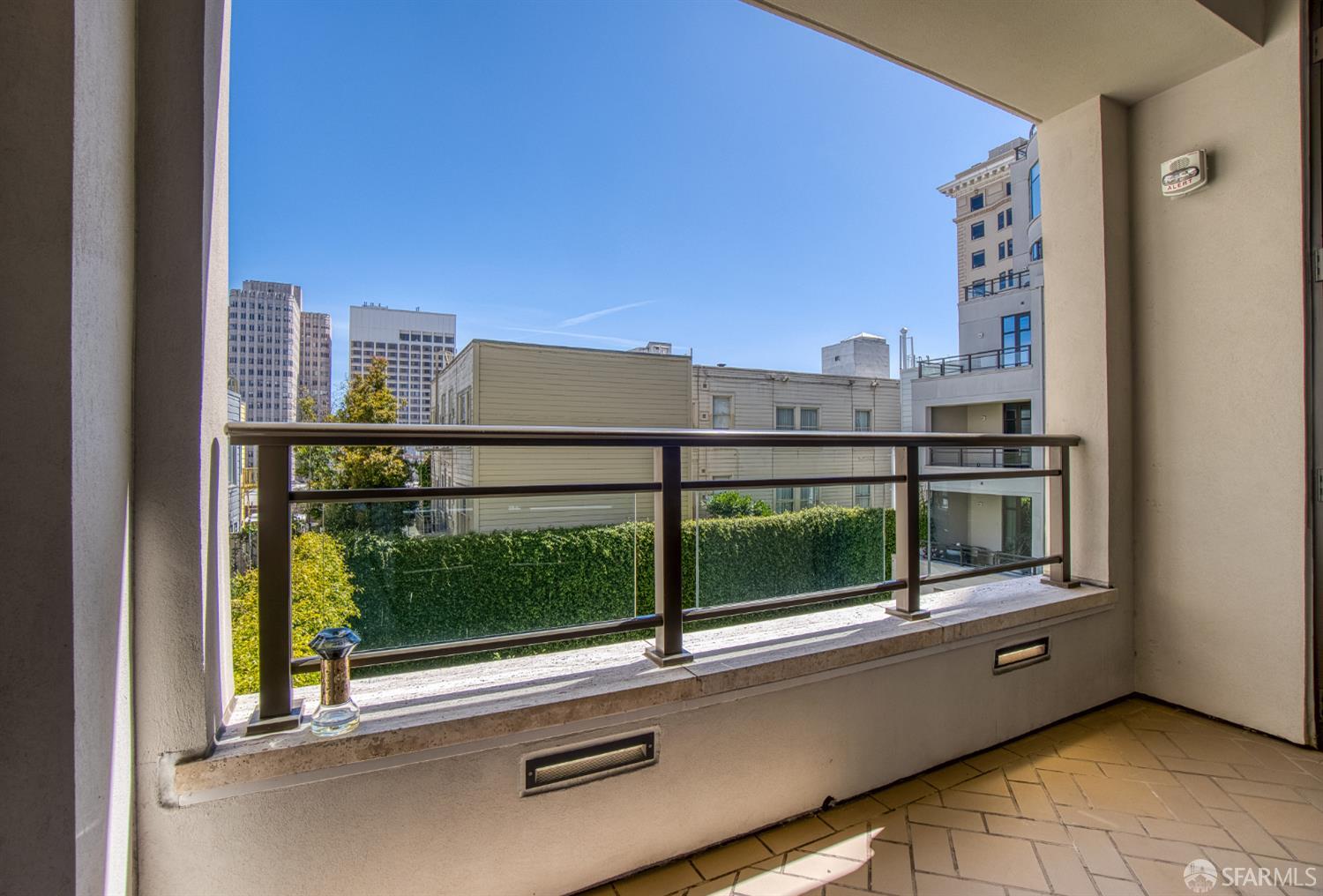 875 California Street, Unit 403 San Francisco, CA 94108 - Photo 39 of 56 a view of a balcony with an outdoor space