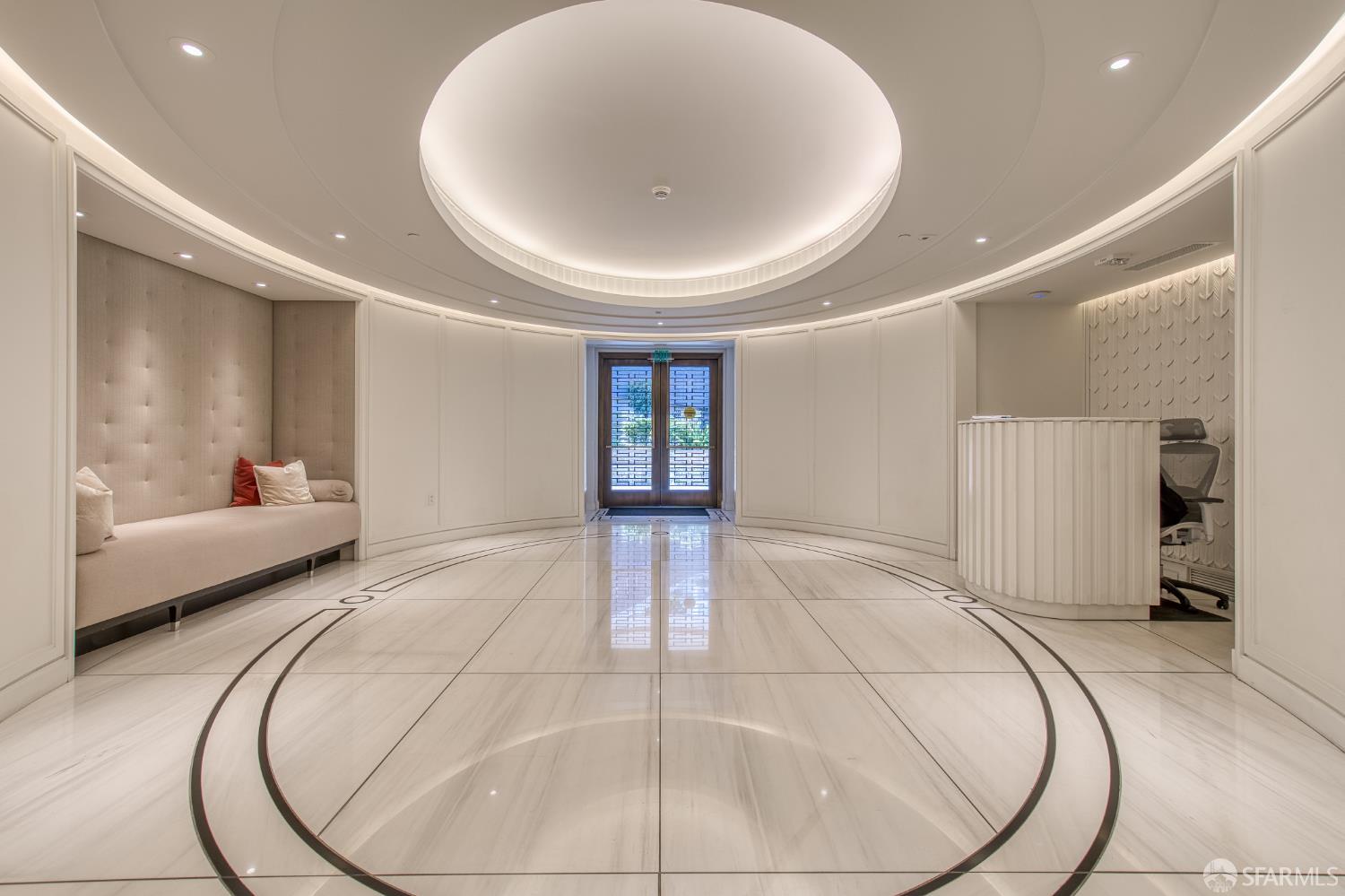 875 California Street, Unit 403 San Francisco, CA 94108 - Photo 55 of 56 a room with a white bed and cabinets