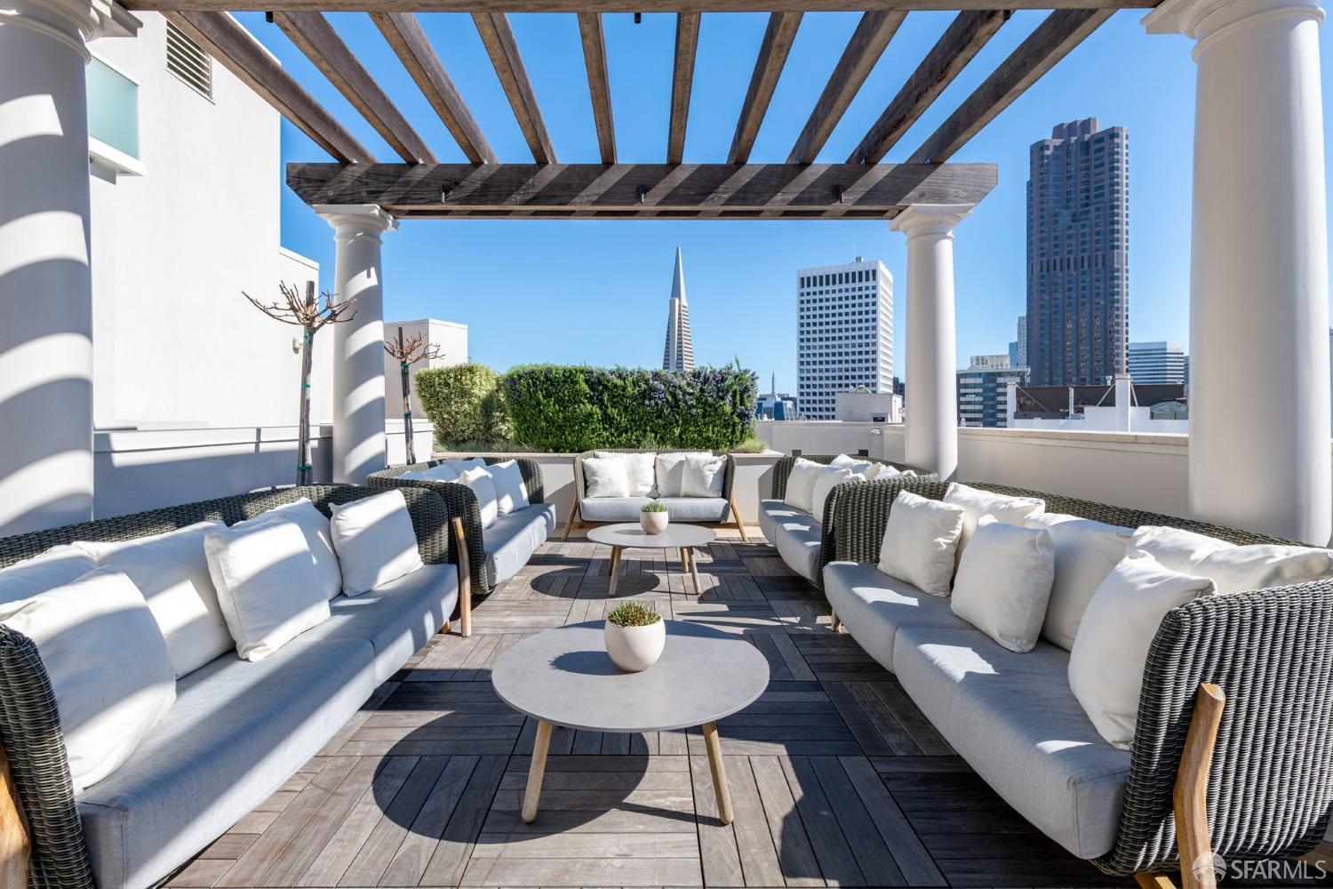 875 California Street, Unit 403 San Francisco, CA 94108 - Photo 6 of 56 a living room with furniture and a large window