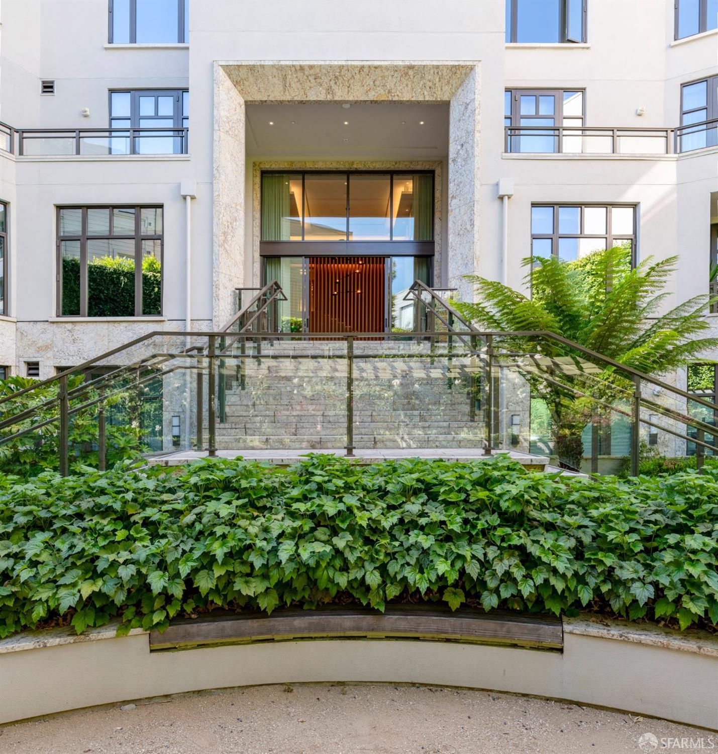 875 California Street, Unit 403 San Francisco, CA 94108 - Photo 9 of 56 a front view of a house with a yard