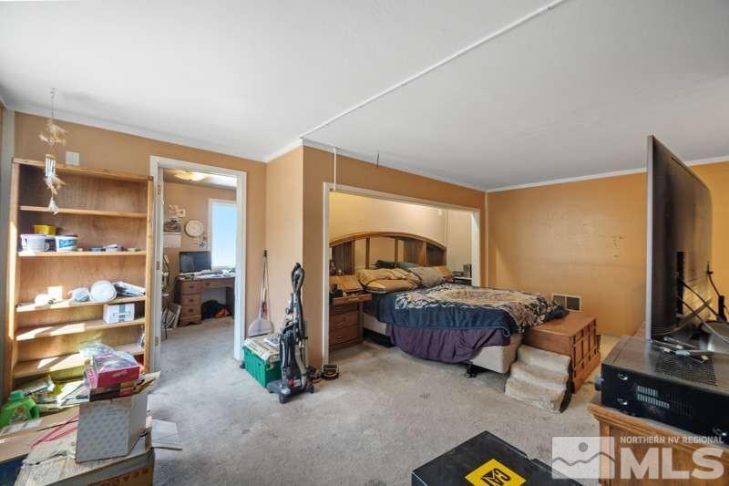 2080 4th Street Sparks, NV 89431 - Photo 12 of 27 a living room with furniture and a flat screen tv