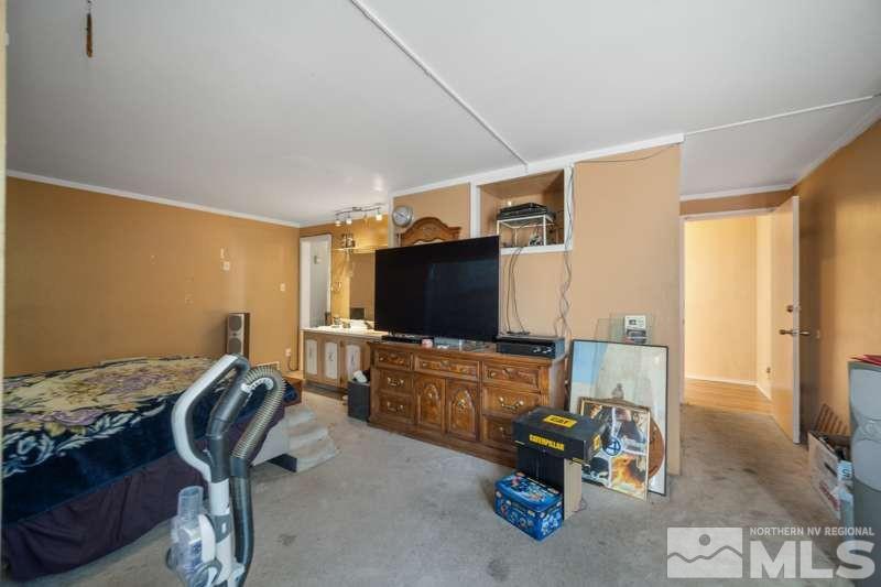 2080 4th Street Sparks, NV 89431 - Photo 13 of 27 a living room with furniture and a flat screen tv