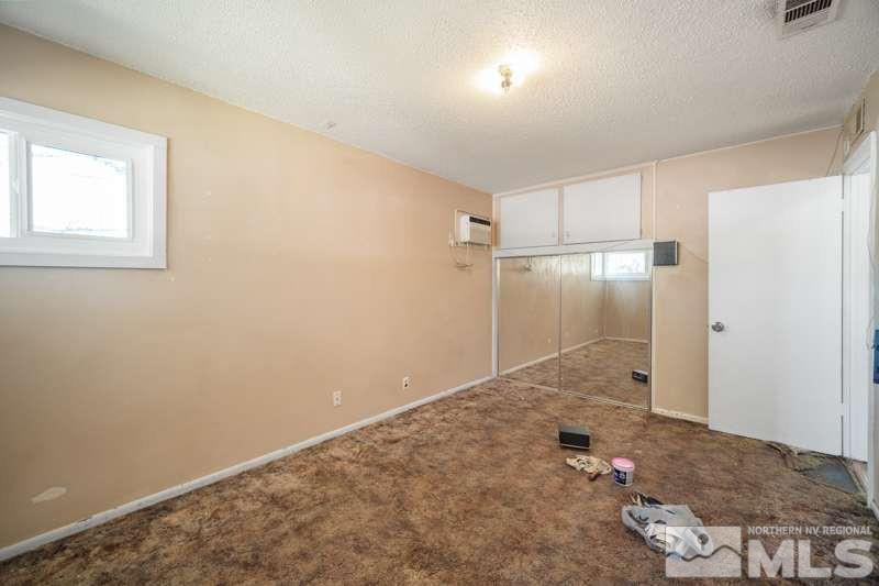 2080 4th Street Sparks, NV 89431 - Photo 19 of 27 a bathroom with a shower and a sink