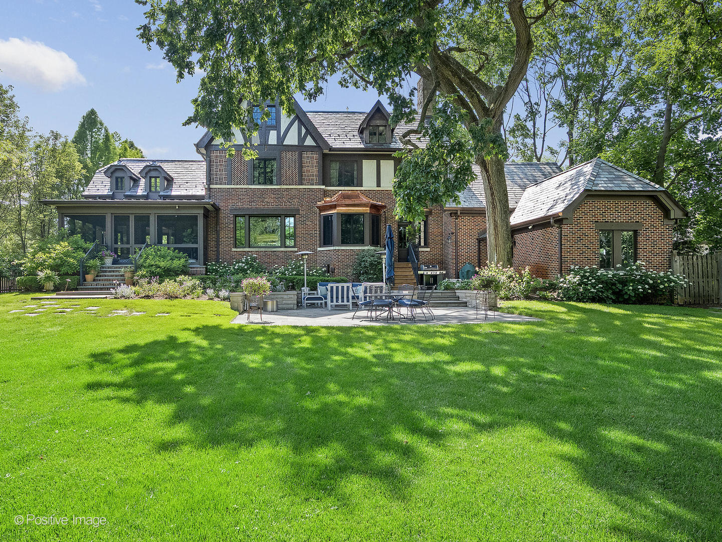 841 South County Line Road Hinsdale, IL 60521 - Photo 11 of 15 a front view of a house with garden