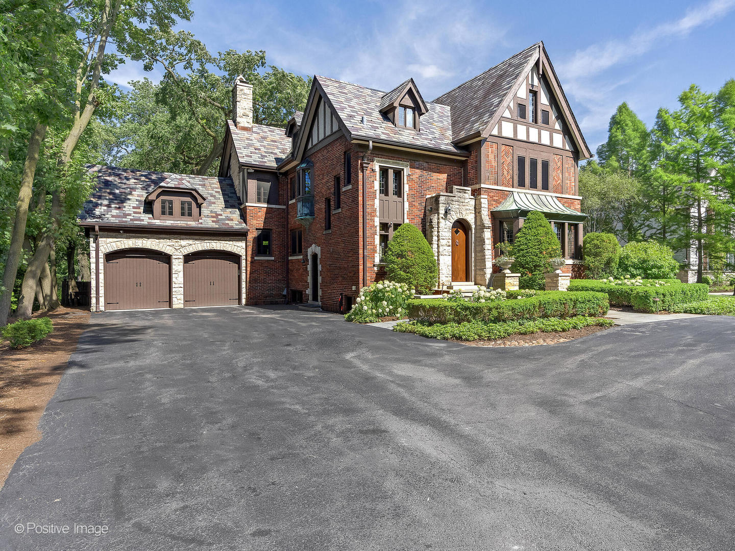 841 South County Line Road Hinsdale, IL 60521 - Photo 15 of 15 front view of a house with a garden
