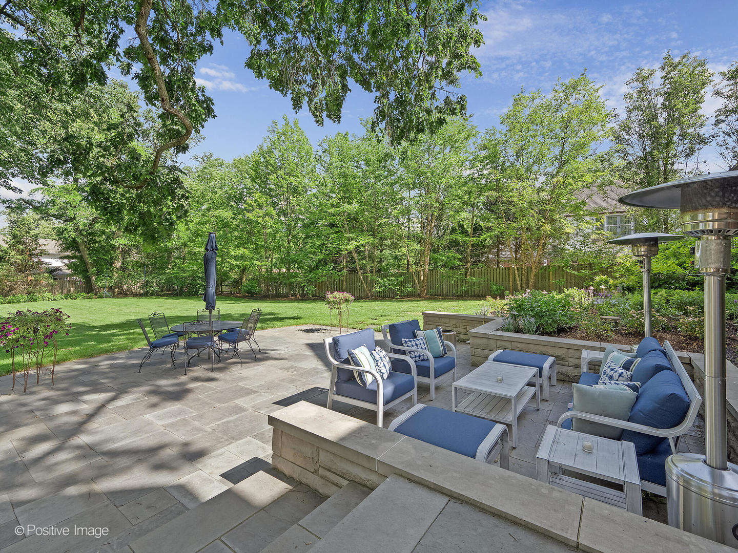 841 South County Line Road Hinsdale, IL 60521 - Photo 8 of 15 an outdoor sitting area with furniture and garden