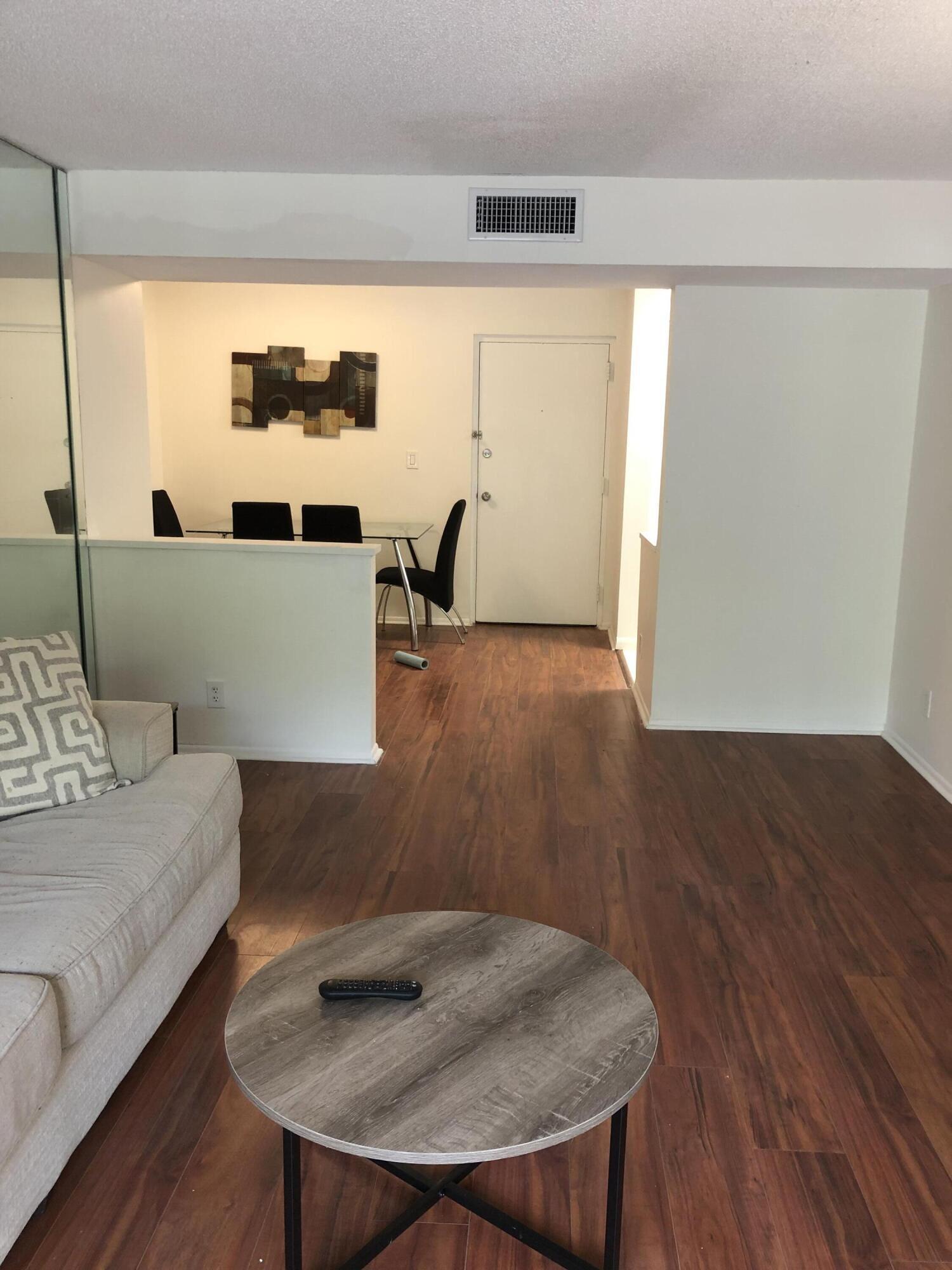 480 Northwest 20th Street, Unit 2140 Boca Raton, FL 33431 - Photo 26 of 29 Living Room - Dining